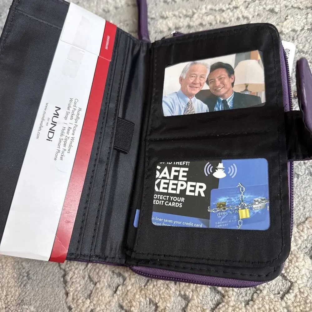 Mundi All In One Purple Clutch Safe Keeper Zipper Photos Card Slots Wrist Strap